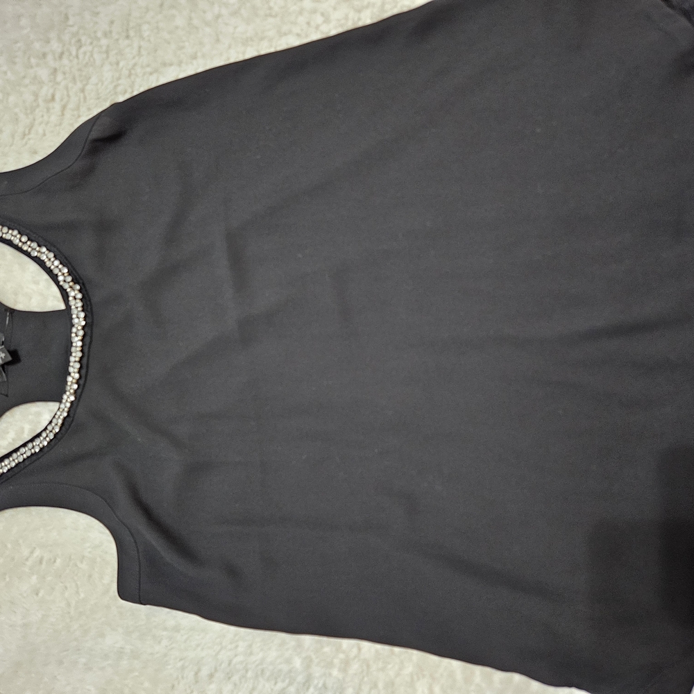 Black Sleeveless Top with Embellished Neckline